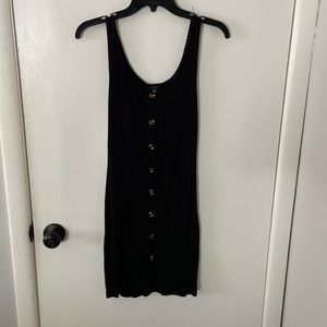 Black sleeveless mini button dress